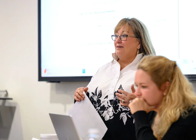 Kelly Rose Hall, Founder of Clayton Rose Group, in a board meeting